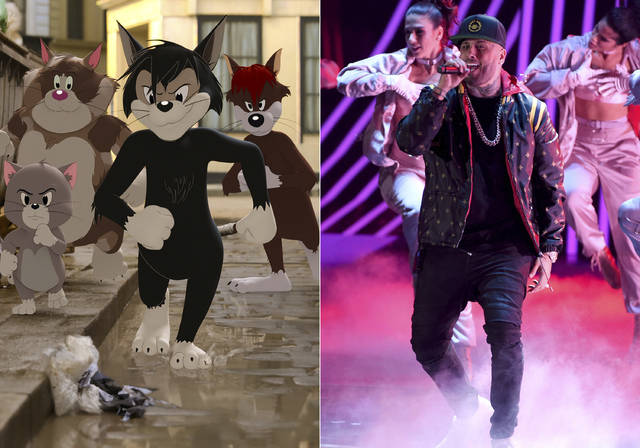 126551710_web1_126551710-da82cc1525f3450b8c71c9f679c69911
Butch, leader of the alley cats, foreground center, voiced by Nicky Jam, appears in a scene from the animated/live-action film Tom & Jerry and Nicky Jam performs at the 18th annual Latin Grammy Awards in Las Vegas on Nov. 16, 2017.