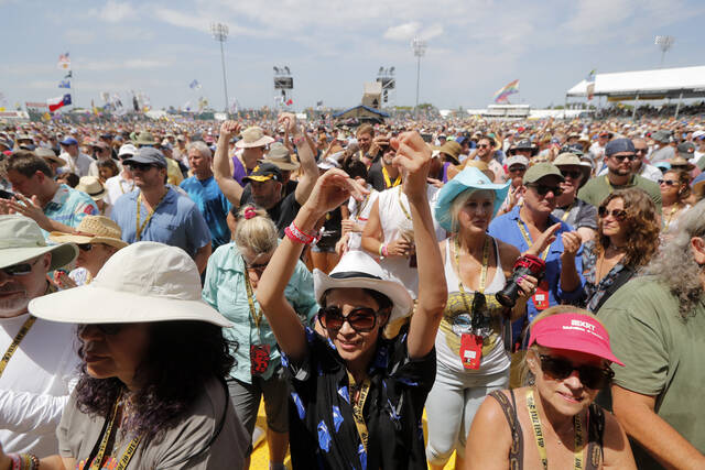 128123039_web1_128123039-21fd23d709c84271996253284e0a4f65
Fans cheer at the New Orleans Jazz & Heritage Festival in New Orleans, Thursday, May 2, 2019. After a two-year hiatus brought on by the coronavirus pandemic, the New Orleans Jazz & Heritage Festival returns this spring with headliners The Who, Stevie Nicks, Foo Fighters, Lionel Richie, Erykah Badu, Ludacris, Nelly and Willie Nelson. Festival organizers announced the lineup for the festival Thursday, Jan. 20, 2022. (AP Photo/Gerald Herbert)