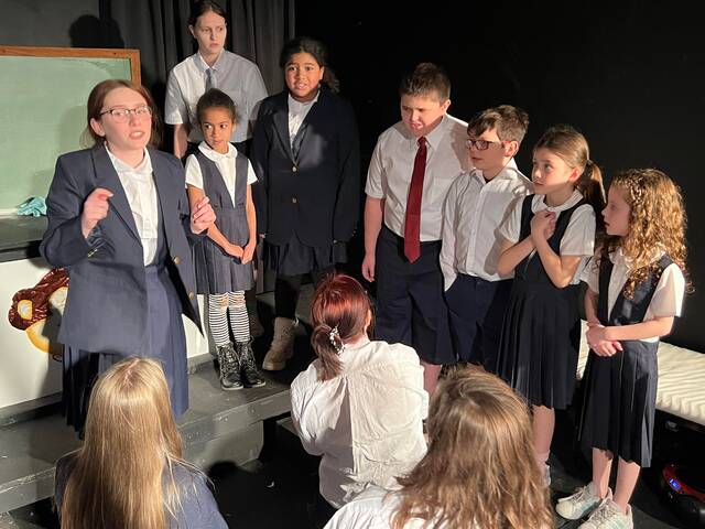 Act Out Theater Group Taylor Matilda From left, Cari Altenhain, Moosic; Thea McKean, Scranton; Jordan Eliott, Scranton; Amya McKean, Scranton; Chase Richmond, Thropp; Jack Whiteduck, Pittston; Violet Stefanski, Dunmore; and Alena Foley, Scranton, gather to hear the horrors of their school.