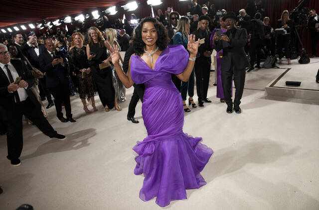 Angela Bassett arrives at the Oscars on Sunday at the Dolby Theatre in Los Angeles.