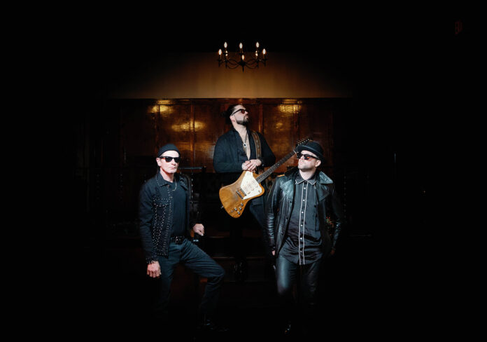 Dustin Douglas & The Electric Gentlemen release new album "Black Leather Blues" and celebrate the debut at River Street Jazz Cafe on April 22.