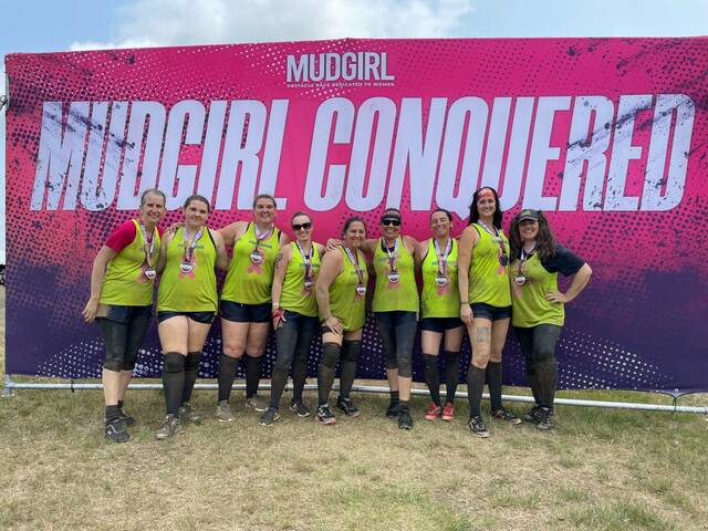 129705197_web1_Mud-Girl-Conquered-2
Classic Properties Fight Squad after the race, from left to right: Christine Pelesko, Zophiel Philmeck, Gwendolyn Philmeck, Denise Gardner, Eileen Healey, Lee Ferreira, Gabrielle Lang, Mary Hillegas, and Jennifer Mazzell.
