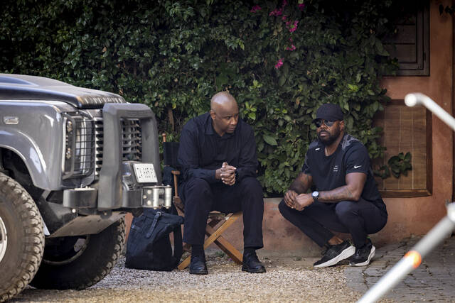 129951887_web1_129951887-eadb3ee0f3814307bec002944ed9129d
This image released by Sony Pictures Entertainment shows Denzel Washington, left, and director Antoine Fuqua on the set of The Equalizer 3.
AP photo
