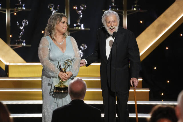 130676467_web1_AP24160028784980
Dick Van Dyke accepts the award for outstanding guest performance in a daytime drama series for Days of our Lives during the 51st Daytime Emmy Awards on Friday at the Westin Bonaventure in Los Angeles. Arlene Silver looks on from left.
AP photo