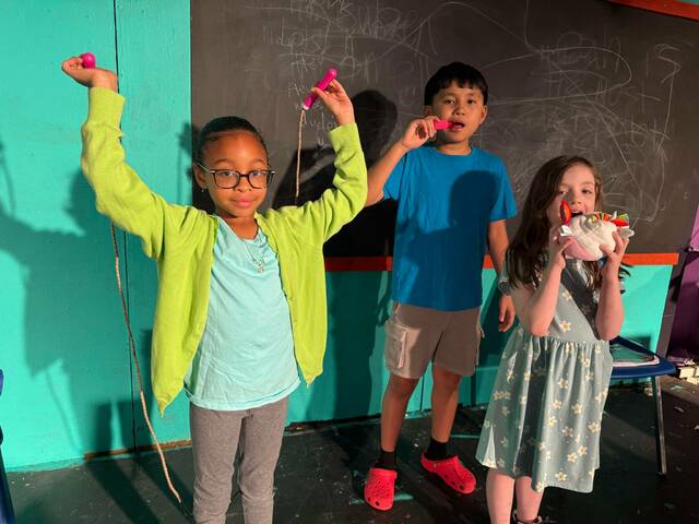 131459512_web1_NELSON3
Whether its playing with toys or eating candy, the students in Miss Nelsons class are always doing something other than their schoolwork. From left: Elena Muñoz, Asbin Rai and Sophia Powell.
<em>Photo Credit — Submitted by Act Out Theatre Group</em>
