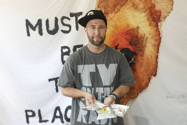 131585050_web1_131576481-d070b0fc2a4b43d383b25127e7dd6490
William Perry, founder of This Must Be The Place, holds free naloxone medication to be given out to concert goers at the Governors Ball Music Festival on Sunday, June 9, 2025, at Flushing Meadows Corona Park in the Queens borough of New York.
Andy Kropa/Invision/AP