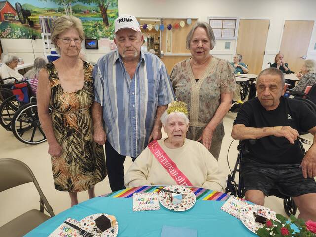 131608921_web1_105birthday
Gathered around Marie Rahill, center, for her 105th birthday party at The Meadows in Dallas are, from left: daughter-in-law Patricia Klein and son Daniel Klein of Evans Falls, daughter Marjorie Dellarte and son-in-law Albert Dellarte of Beaumont.
Mary Therese Biebel | Times Leader