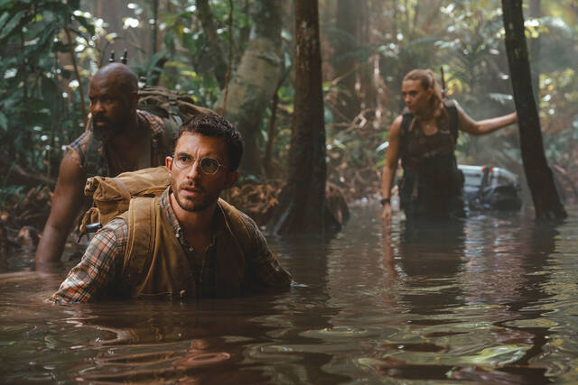 131628493_web1_131621870-38d014bcbe2242c095658b197b6b4f45
This image released by Universal Pictures and Amblin Entertainment shows, from left, Bechir Sylvain, Jonathan Bailey, and Scarlett Johansson in a scene from Jurassic World Rebirth.
Jasin Boland/Universal Pictures and Amblin Entertainment via AP