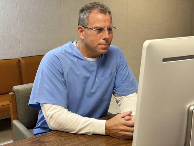 131731722_web1_131731722-8a05cd18b9cf431cb0b5abd62c0dbcbe
Erik Menendez appears before the parole board via teleconference on Thursday at the Richard J. Donovan Correctional Facility in San Diego.
California Department of Corrections via AP