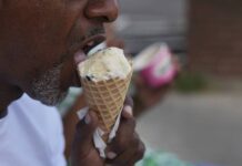 
			
				                                A person eats ice cream in Cincinnati on Friday.
                                 AP Photo

			
		