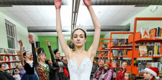 
			
				                                Melina Ospina-Wiese, of Dance Theater of Wilkes-Barre, is front and center during a brief performance of excerpts from The Nutcracker Spectacular, at the West Pittston Library on Wednesday evening. The dancers will perform the holiday show at 3 p.m. Dec. 21 at the F.M. Kirby Center in downtown Wilkes-Barre.
                                 Tony Callaio | For Times Leader

			
		
