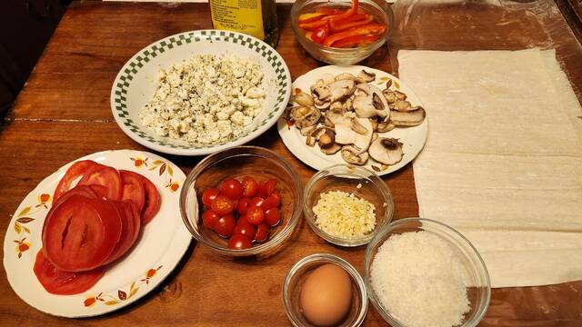 <p>The ingredients for a phyllo dough pizza with tomatoes, mushrooms and feta cheese. The only thing I’ll change in the future is to use a block of feta and crumble it myself, rather than buying the stuff that’s already crumbled. The latter failed to melt at all.</p>
<p>Mark Guydish | for Times Leader</p>