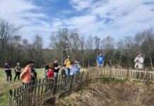 
			
				                                Christine Leandris gifted class from Wyoming Area Middle School gathers around a rain garden at the Lehman Sanctuary, where Sanctuary director Chris Miller, at far right, explains how the garden helps keep pollutants out of the pure water in the wetlands at the Sanctuary.
                                 Mary Therese Biebel | Times Leader

			
		